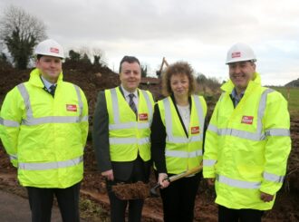 Sports Minister Carál Ní Chuilín has announced funding of £800,000 towards new facilities for Antrim GAA at Dunsilly is seen here with Antrim county chairman Colin Donnelly plus Peter McMahon and Val Brown of contractors Russell Bros. Builders Ltd.